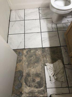 Half done, broken tile, broken grout