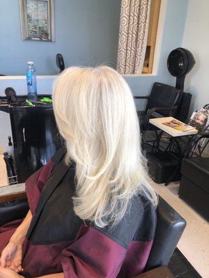 Long layers, highlights all over  root color in the front sides and bang to cover the grey. By Tracy 310-429-3153