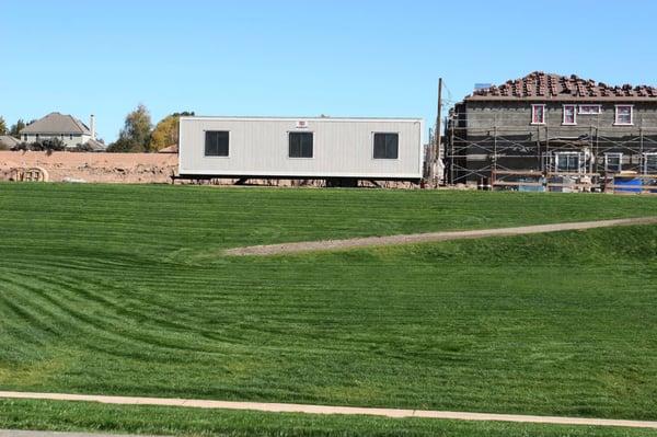 12x40 office trailer on construction site.