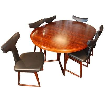 Rare dining table and six leather chairs by Arne Vodder.