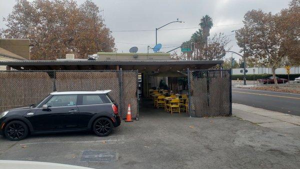 Parking area with access to patio.