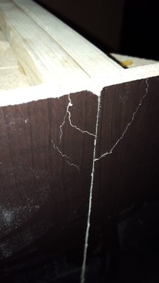 Damage to our cabinetry done by Pacific Ridge workers during installation. They never fixed it!!!