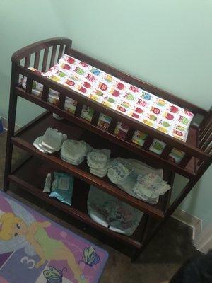 Changing table fully stocked in case you're missing something in your diaper bag! So handy!