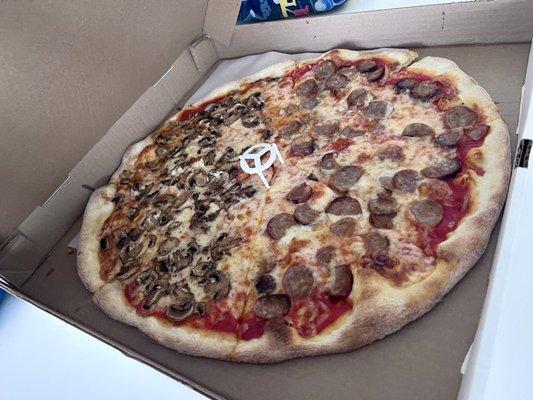 Large pie with sausage and mushroom