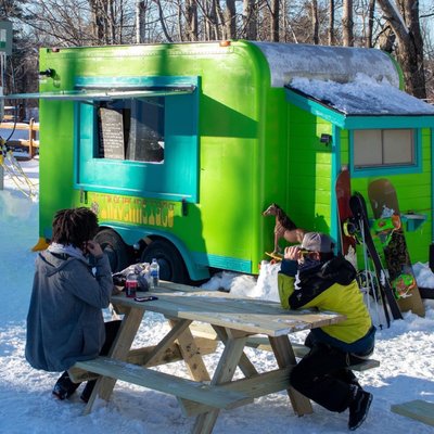 Traveling taco truck at the base of the triple peak