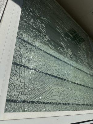 You can clearly see where the rock hit the window