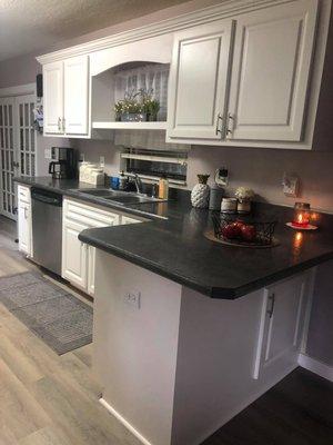 Resurfaced Cabinets and new countertops Sink Wall from Penn. Changed Valance/Shelf and added Crown Molding