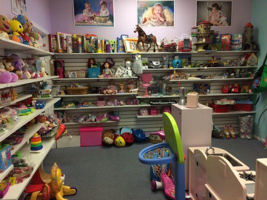 Room with used toys and books, well organized and clean. No children allowed in this room without an adult.