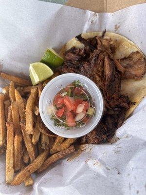 Rudy's Birria monster taco with fries