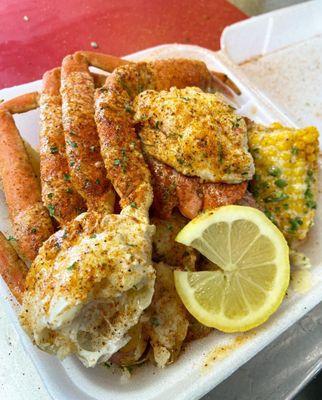 Crab Legs , Lobster Tail , potatoes , & Corn