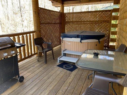 Back porch with hot tub and grill