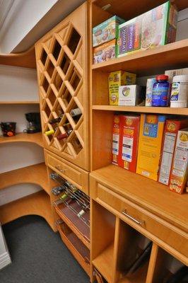 A pantry with custom storage for wine and more