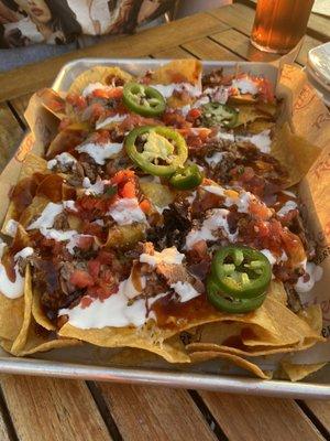 The brisket nachos with BBQ sauce