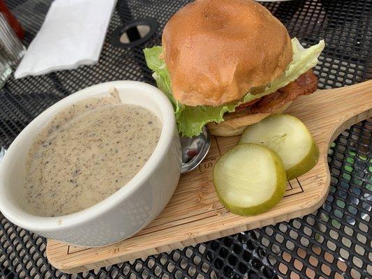 Cup of top notch mushroom soup and BLT on a brioche roll. Not pictured--the crostini.