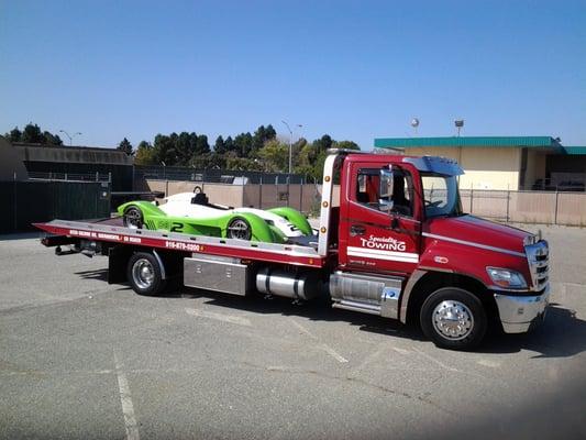 Towing a race car! Damage free and with the utmost of care.