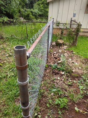 Replaced torn fencing