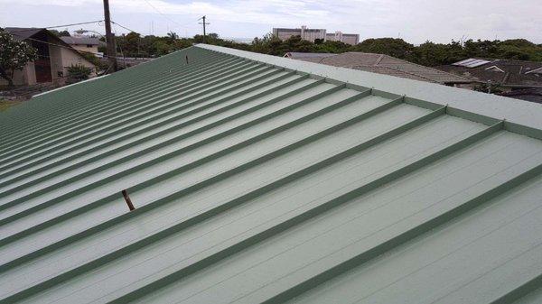 Hilo Roofing Crew metal slanted roof