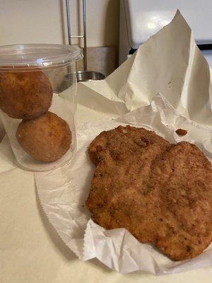 Huge fried chicken cutlet and arancini