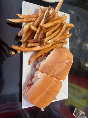 Chicken Parm hero with fries