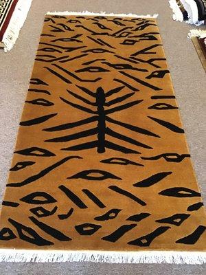 3x6 Abstract Tiger Rug $680.
 100 knots/ sq.in. Hand knotted wool