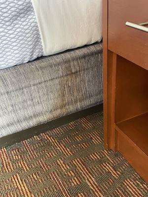 Unknown stain on side of the bed