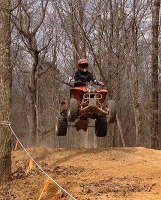 My buddy jumping the table top on the big MX track at The Ridge.