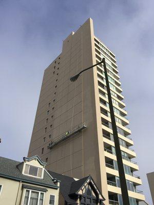 K&H Workers performing concrete repair, sealant joint and elastomeric coating installation at the top of Russian Hill SF