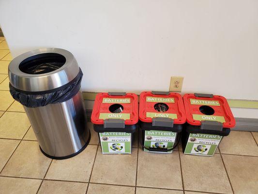 Battery recycling bins by the entrance