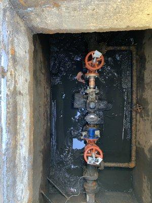 Installation of 3" inch flanged Gate Valves inside meter pit.