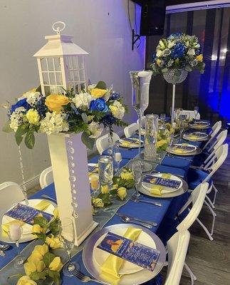 Custom Fresh flowers center piece , floating candles, custom dinner menu, table/chair/chair cushions rentals.