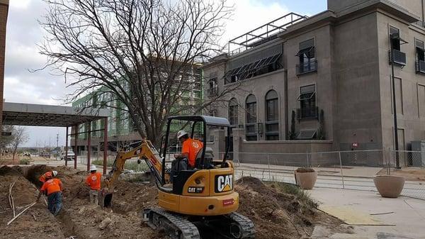 Excavating for underground sleeve's to be installed at the Domain in Austin TX