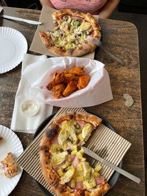 Two small personalized pizzas and hot wings