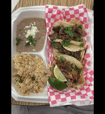 Carne Asada street tacos, one carnitas street taco, Rice and beans