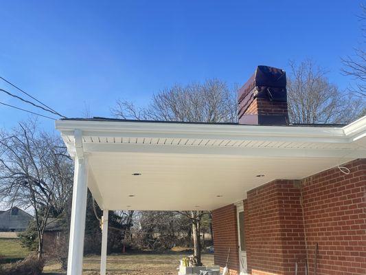 New siding, covered porch.