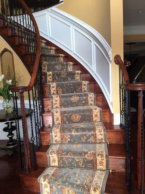 Custom runner with brass stair rods on a wrap around staircase - Hillsborough, NJ