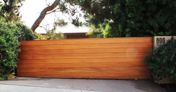 Exotic wood automatic sliding gate