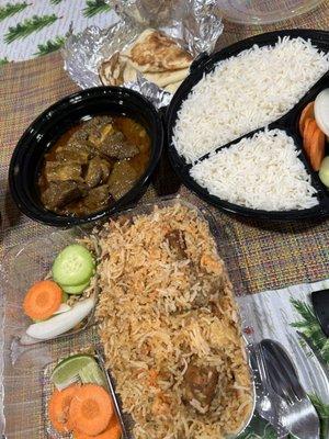 Chicken Biryani and Beef curry with rice and Naan.