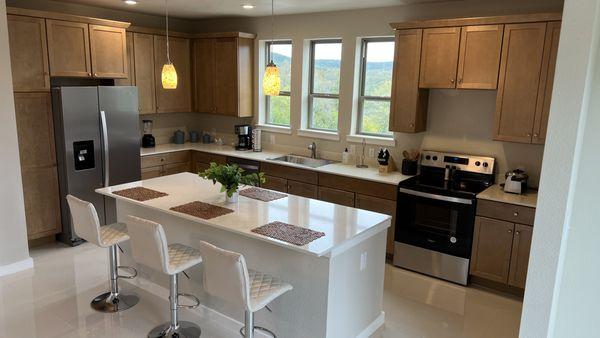 Custom cabinets with quartz countertops.