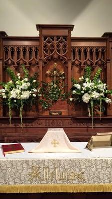 Calvary's Altar with flowers and smilax