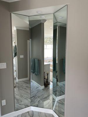 Mirrors installed in master bath for dressing.