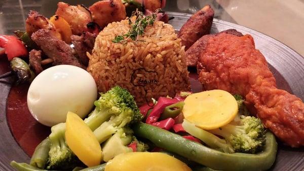 a mixed meal of Kabob and  fried chicken for that one lucky hungry stomach!