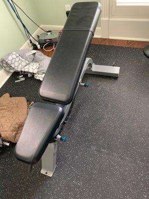 Adjustable height workout bench