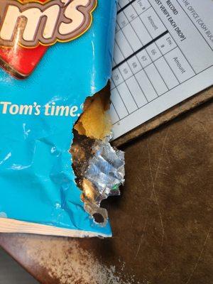 Mouse chewed chip bag