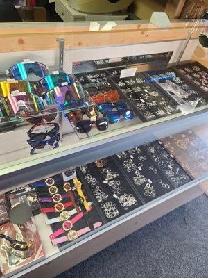 Body jewelry, sunglasses, watches