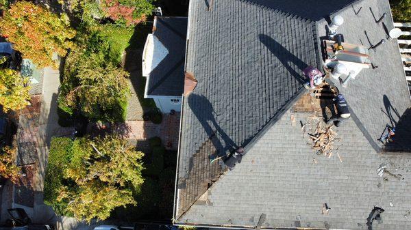 Wood shake roof demolition in progress