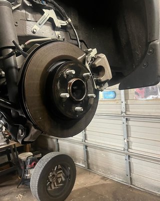 Brake check and clean brakes and rotors prevents squeaking. Squeaking can be caused by a build up of brake dust