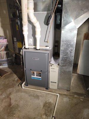 95% up flow furnace with a 4 cased coil