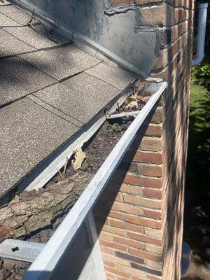 Gutters before cleaning