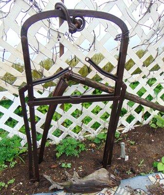 ...Vintage Hay Hoist and a sickle . Out door lawn and garden ornament. FB message or E-mail  me if you are interested in the pair. Thanks.