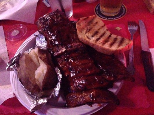 Full slab of ribs baked potato SO GOOD!!!!